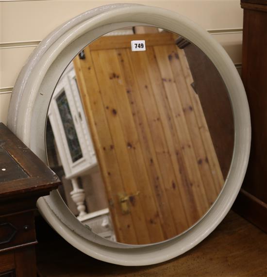 A pair of circular mirrors W.57cm